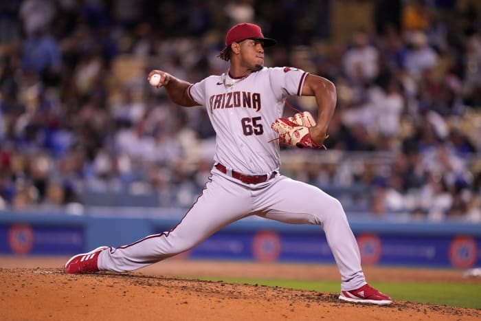 Sep 19, 2022; Los Angeles, California, USA; Arizona Diamondbacks pitcher Luis Frias (65) throws in the eighth inning against the Los Angeles Dodgers at Dodger Stadium. Mandatory Credit: Kirby Lee-USA TODAY Sports